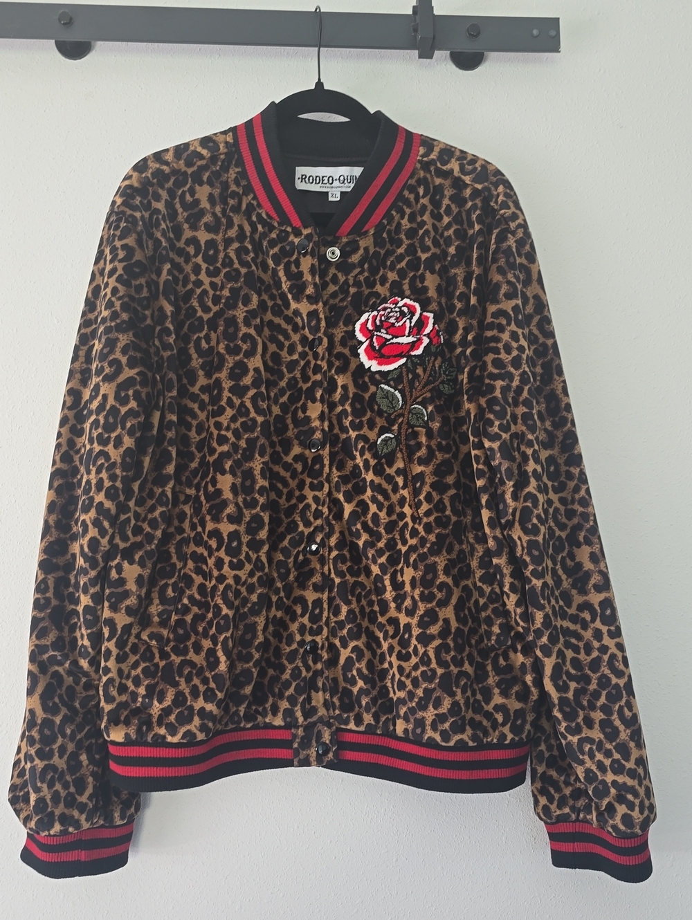 RODEO QUINCY. Leopard Print Varsity Jacket with Red Rose Patch.